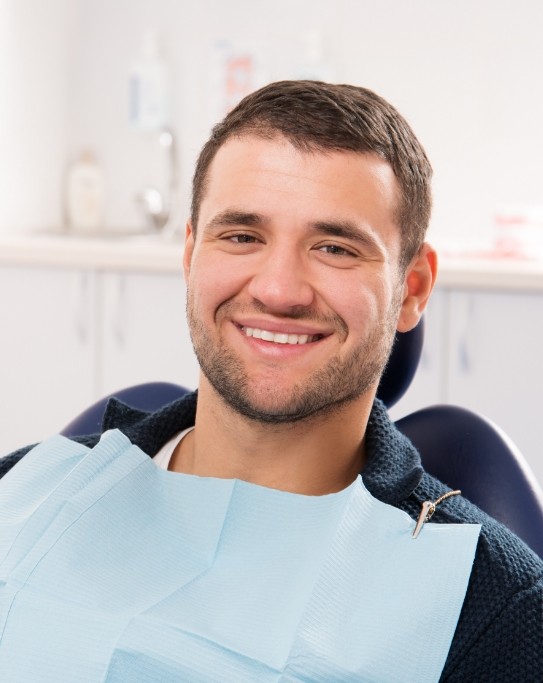 Man smiling in dental chair