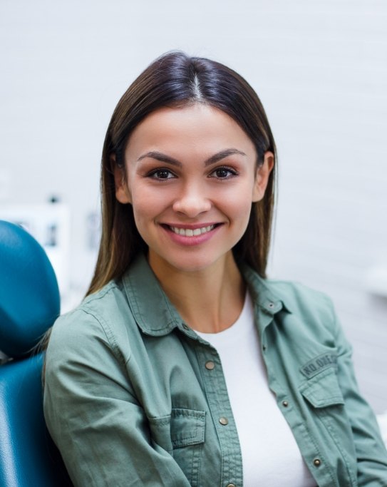 Smiling woman in dental chair