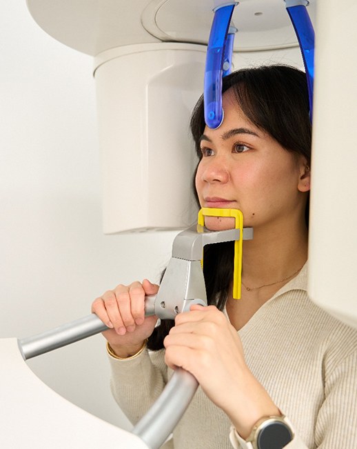 Dental patient positioned inside CBCT scanner