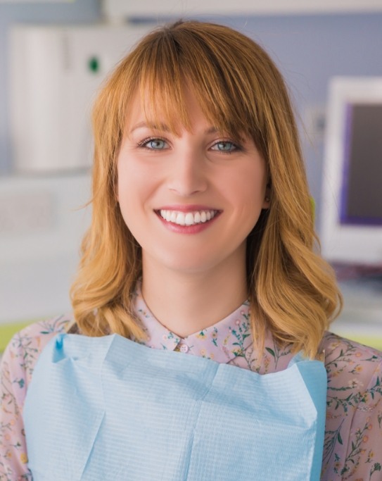 Smiling woman in dental chair