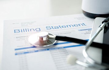 Medical billing statement with stethoscope