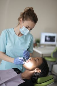 Woman at dentist in Gramercy Park during COVID-19 pandemic. 