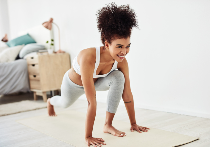 person smiling while exercising