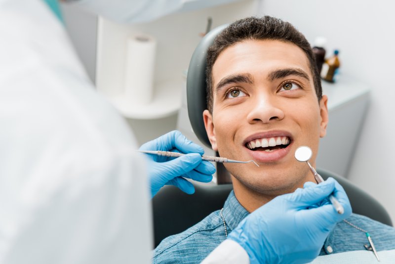 Cheerful man having a dental checkup