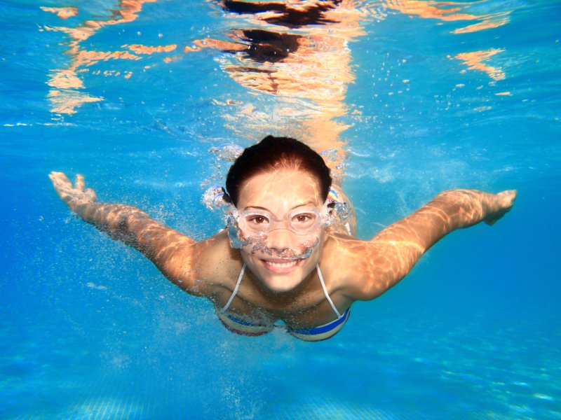 Woman swimming underwater