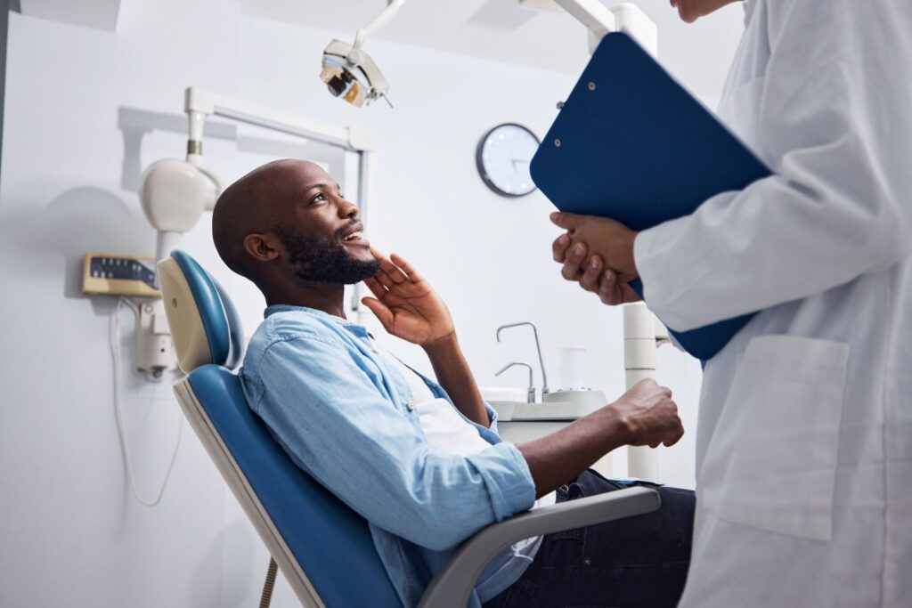 A man talking to his dentist
